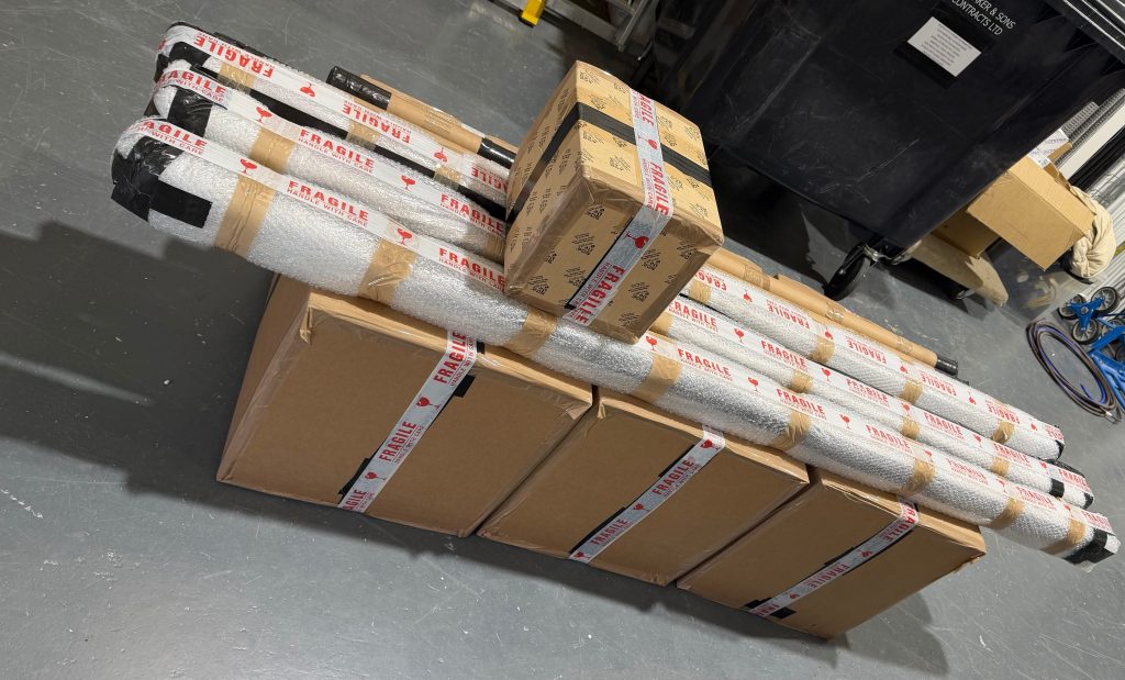 Securely wrapped lighting products prepared for international transport