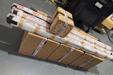 Securely wrapped lighting products prepared for international transport