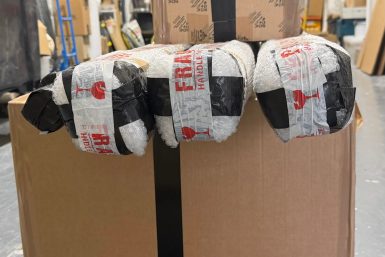 Packed electrical goods ready for UK to Ireland road freight transport